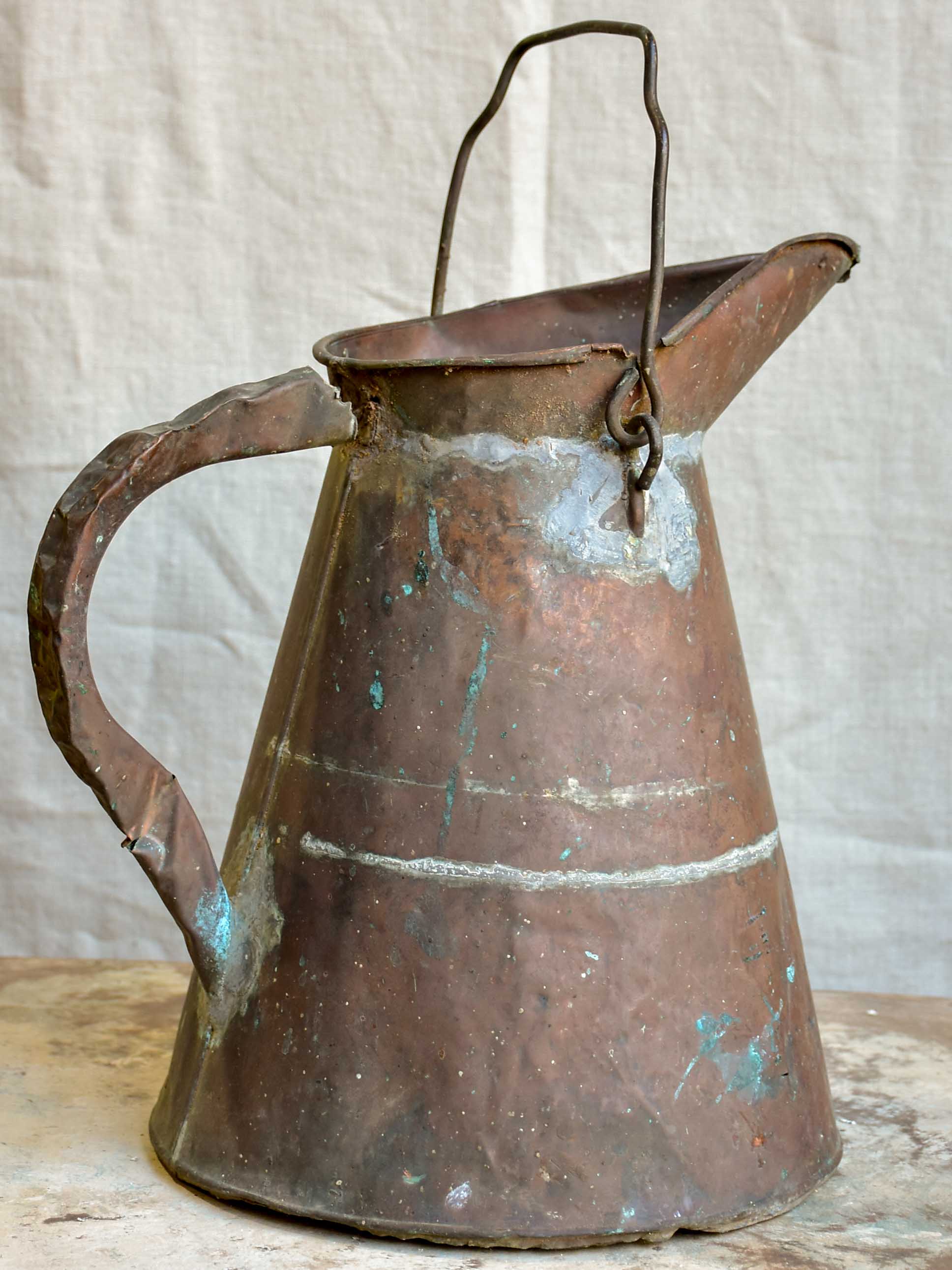 Rustic antique French copper watering can