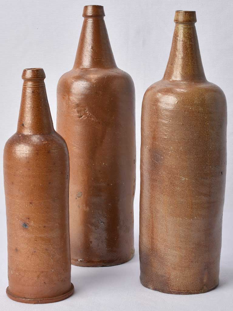 3 sandstone long bottles from Normandy 12¼"