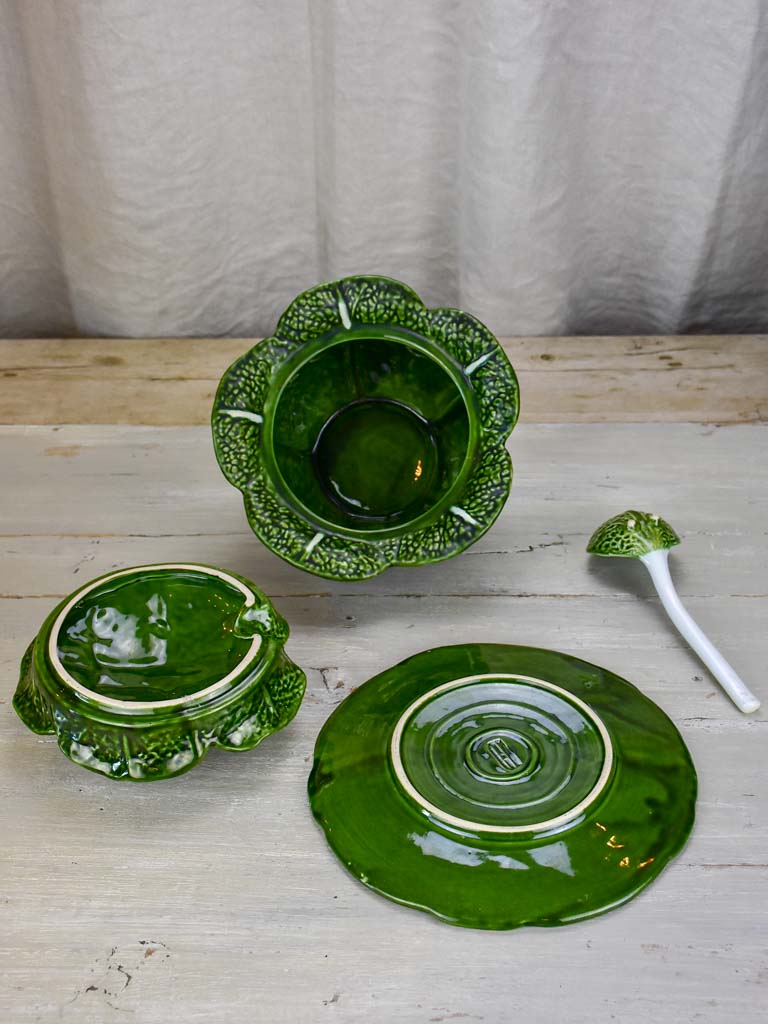 Collection of vintage cabbage leaf plates, platters and soup tureen