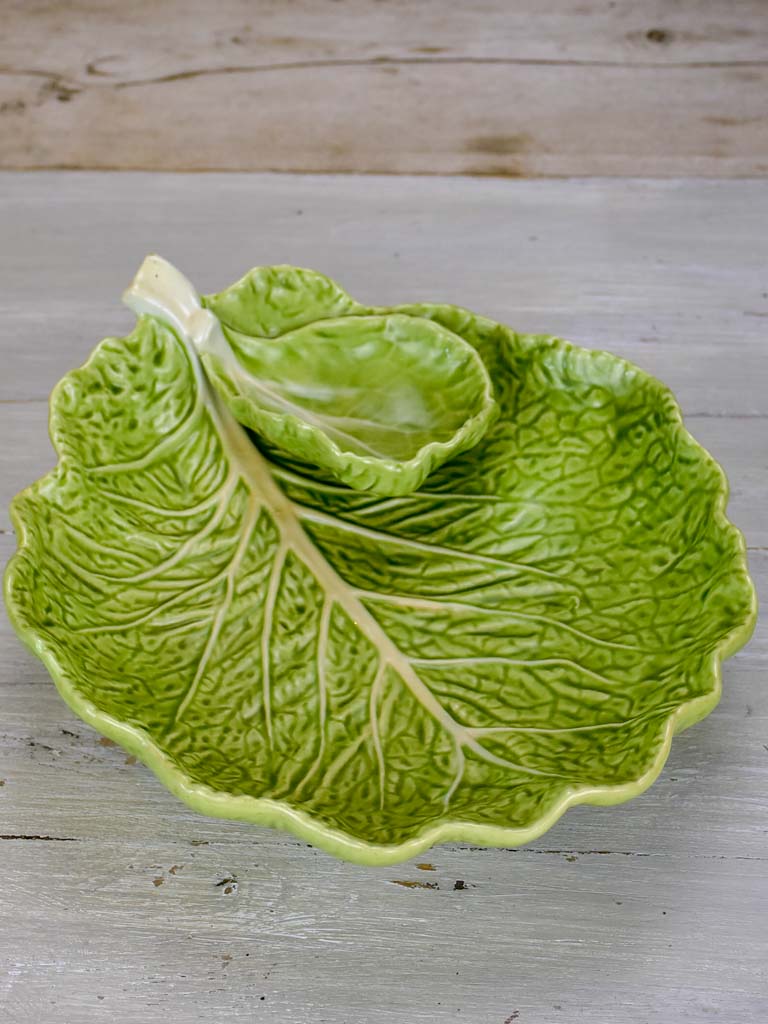 Collection of vintage cabbage leaf plates, platters and soup tureen