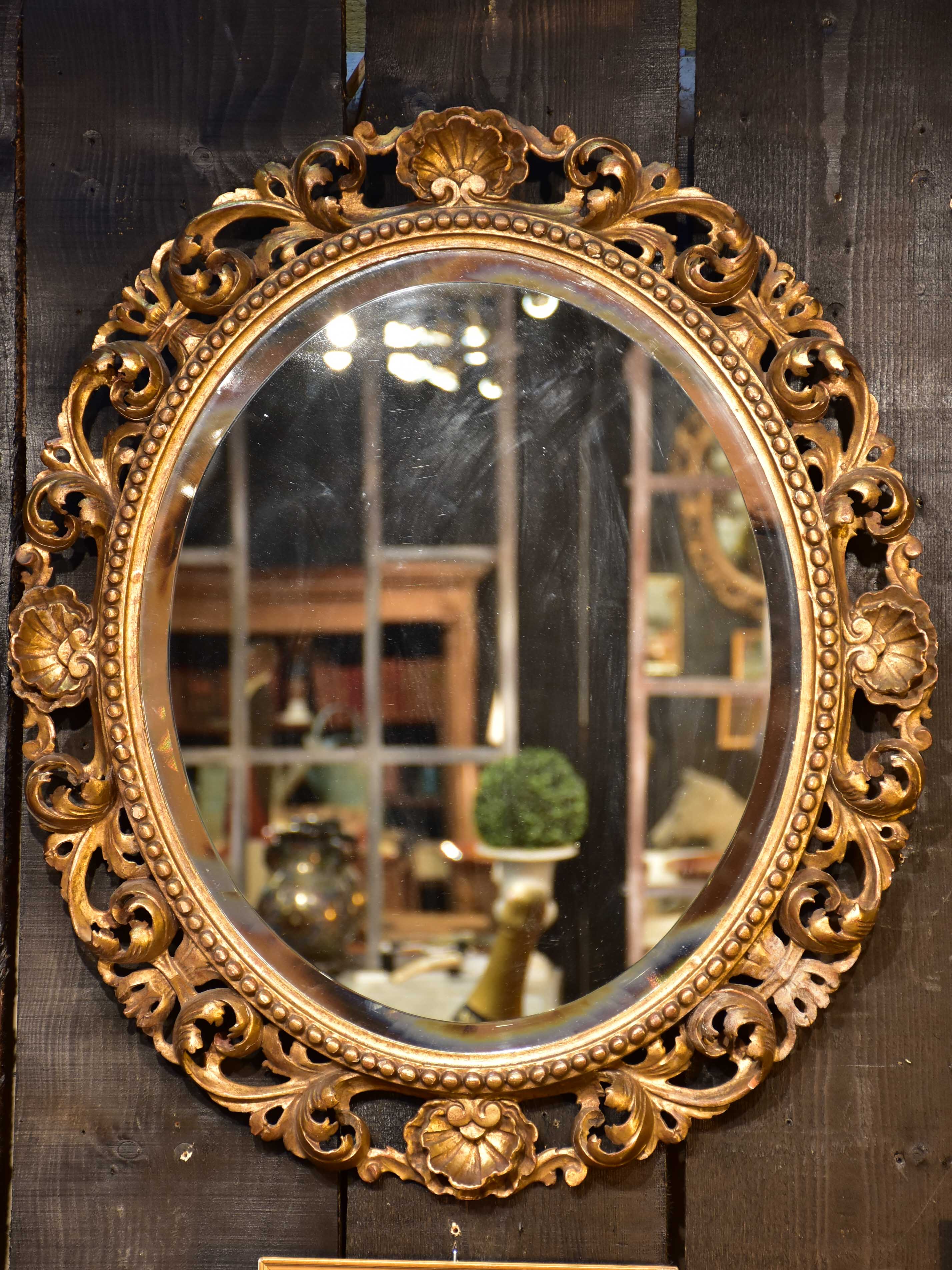 Antique French oval mirror with giltwoood frame