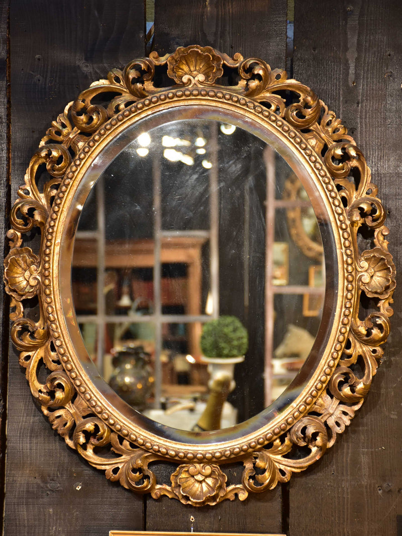 antique oval wood mirror