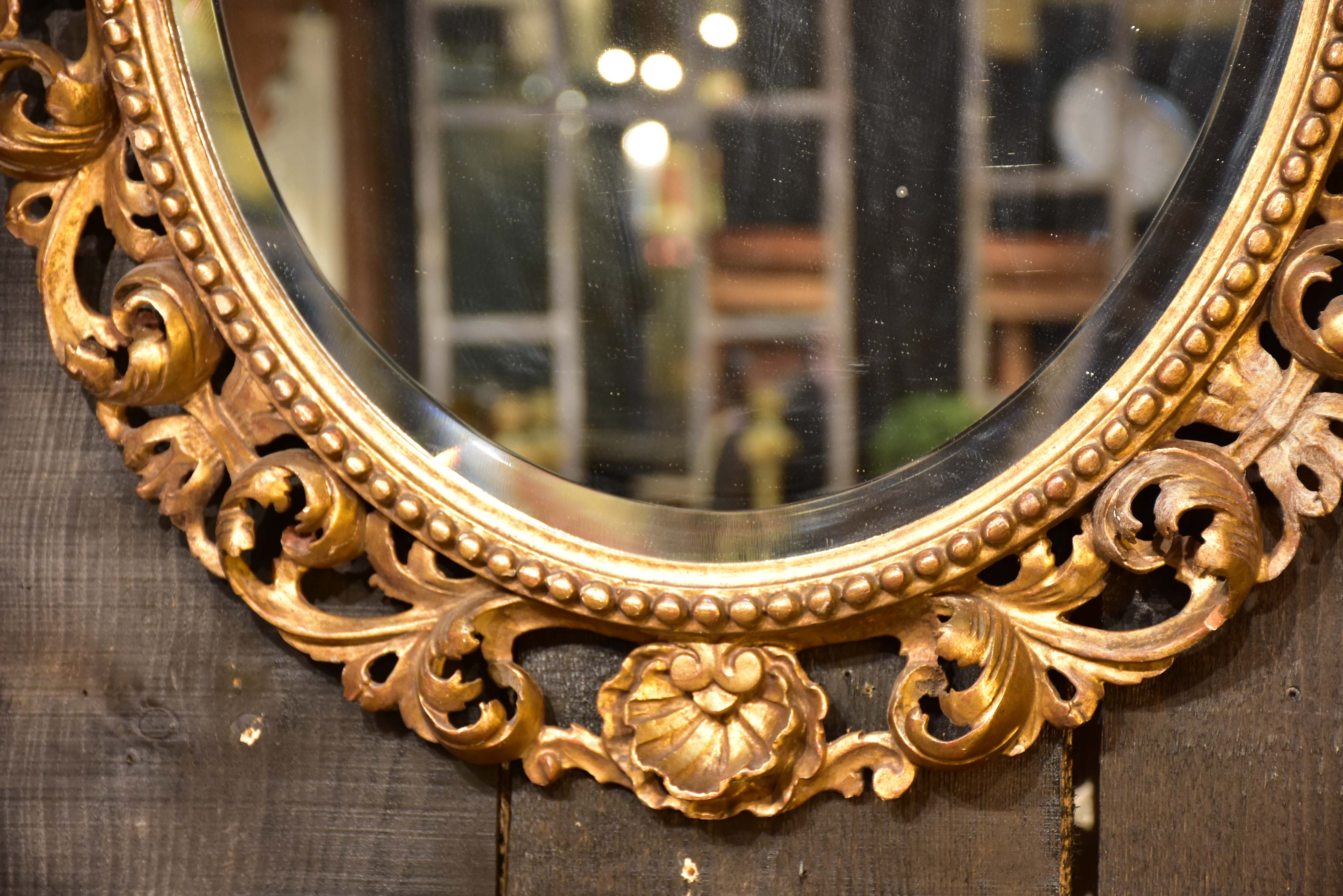 Antique French oval mirror with giltwoood frame