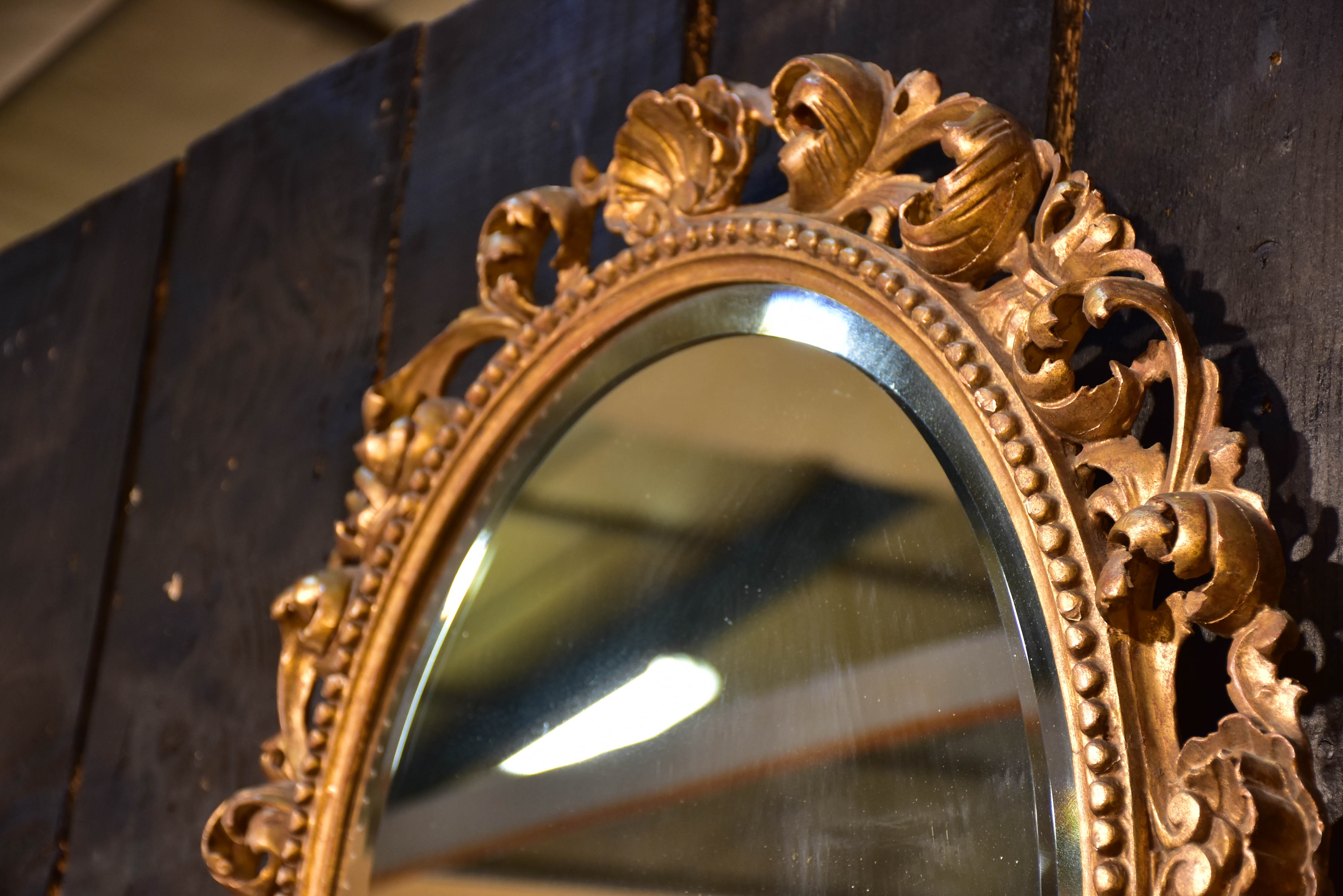 Antique French oval mirror with giltwoood frame