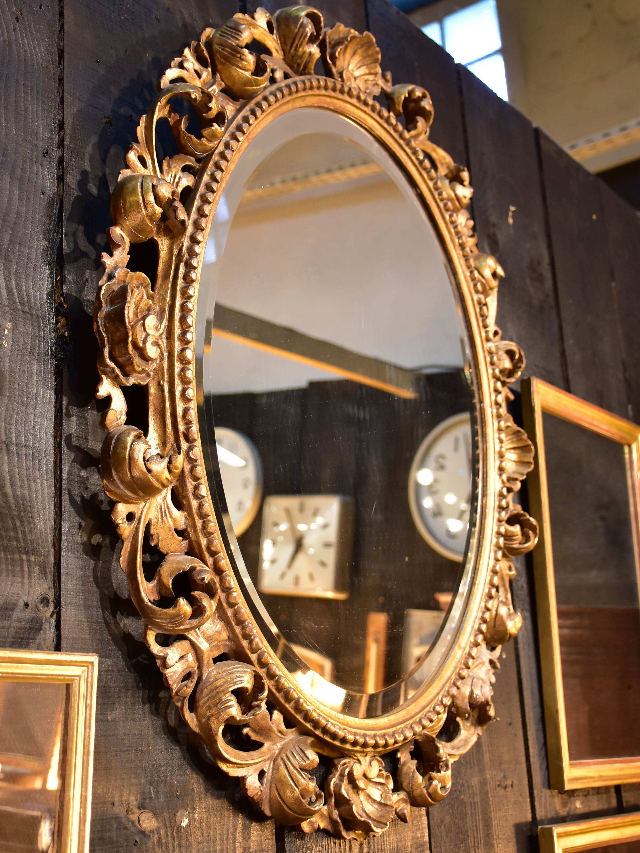 Antique French oval mirror with giltwoood frame