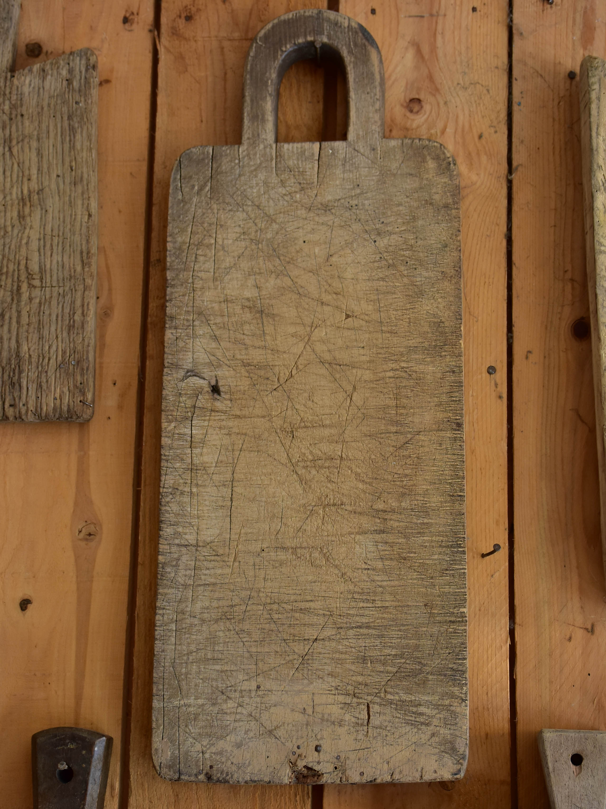 Antique French cutting board with round handle