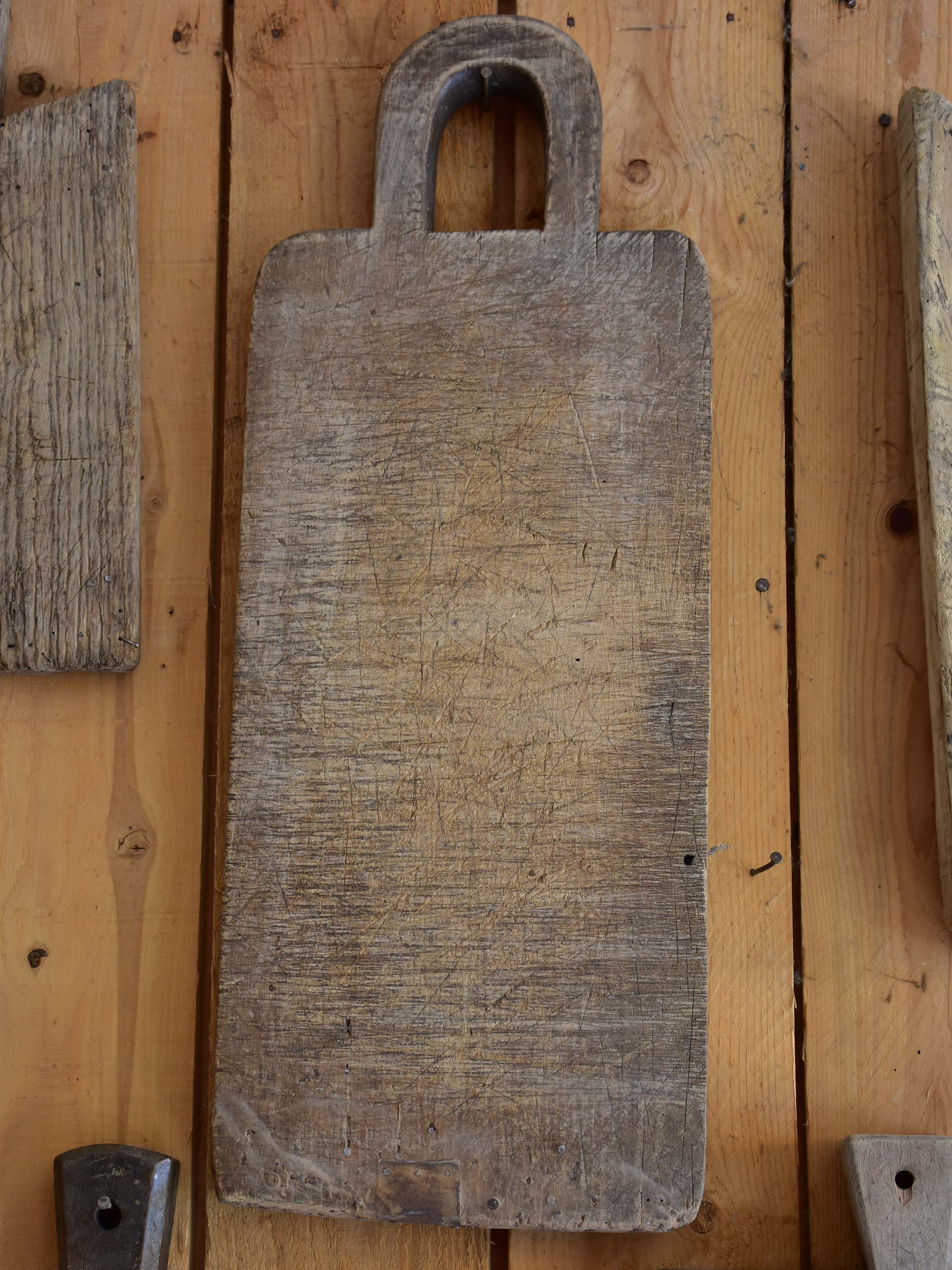 Antique French cutting board with round handle