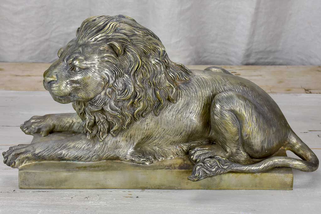 Pair of antique French lion sculptures in bronze