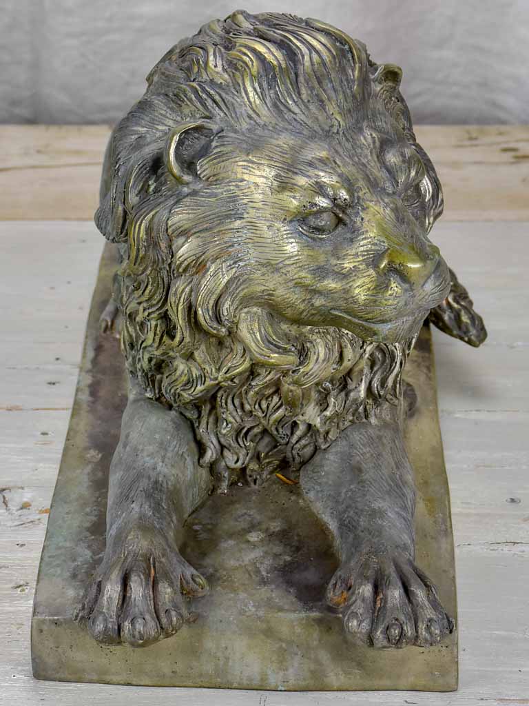 Pair of antique French lion sculptures in bronze