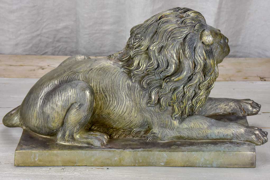 Pair of antique French lion sculptures in bronze