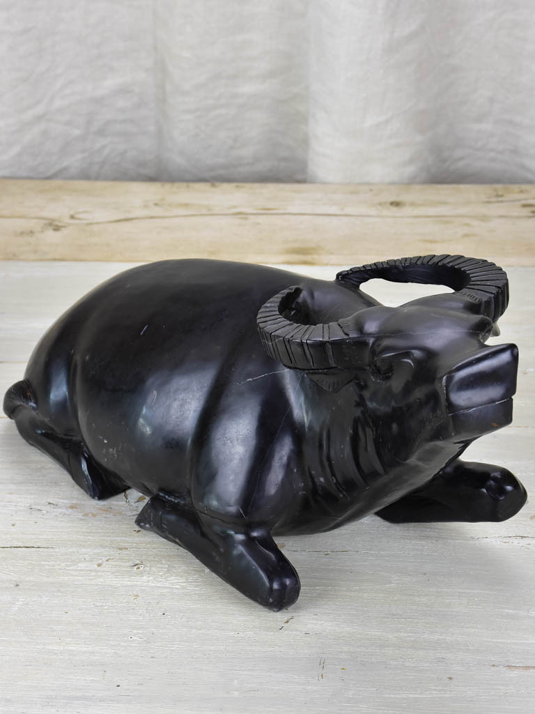 Black marble sculpture of a buffalo