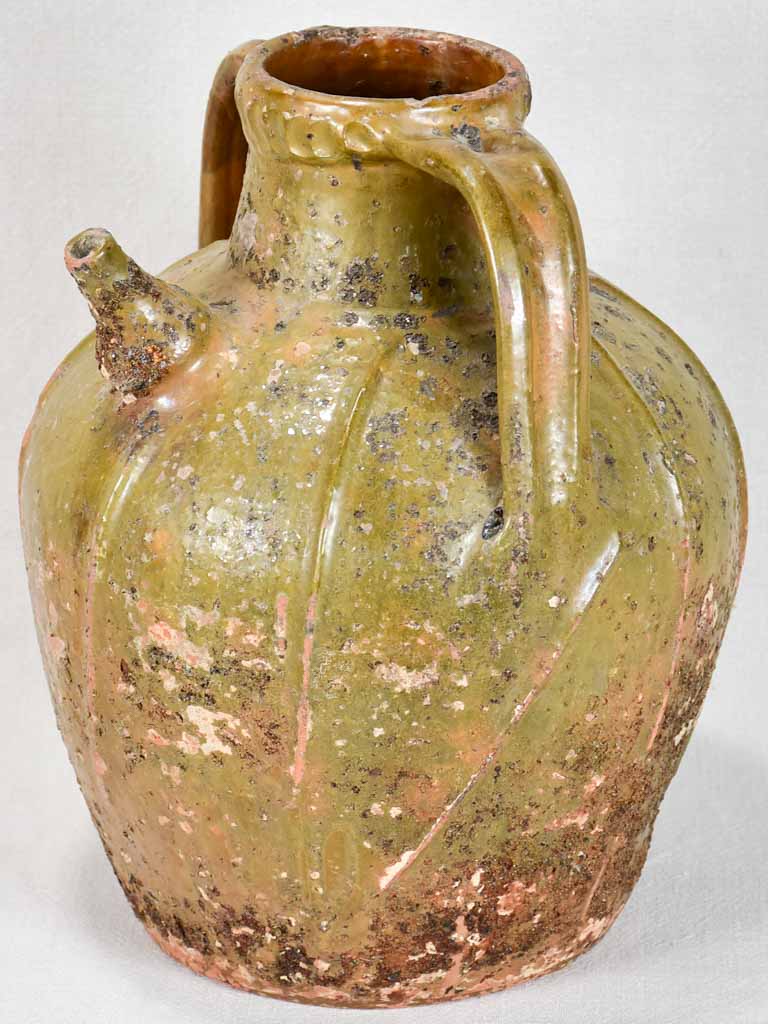 19th-century walnut oil pitcher from the Ardeche - olive green 15¾"