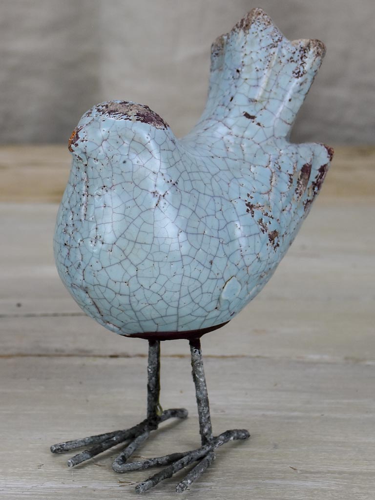 Two artisan made bird sculptures