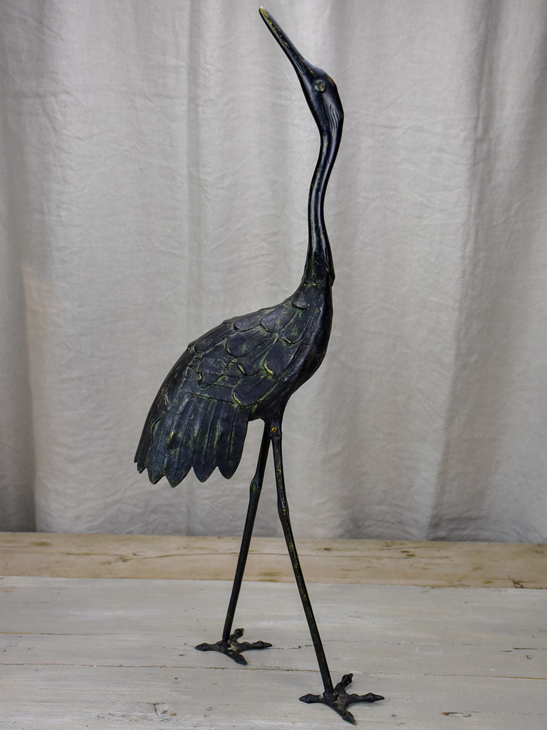 Two vintage garden sculptures of ibis