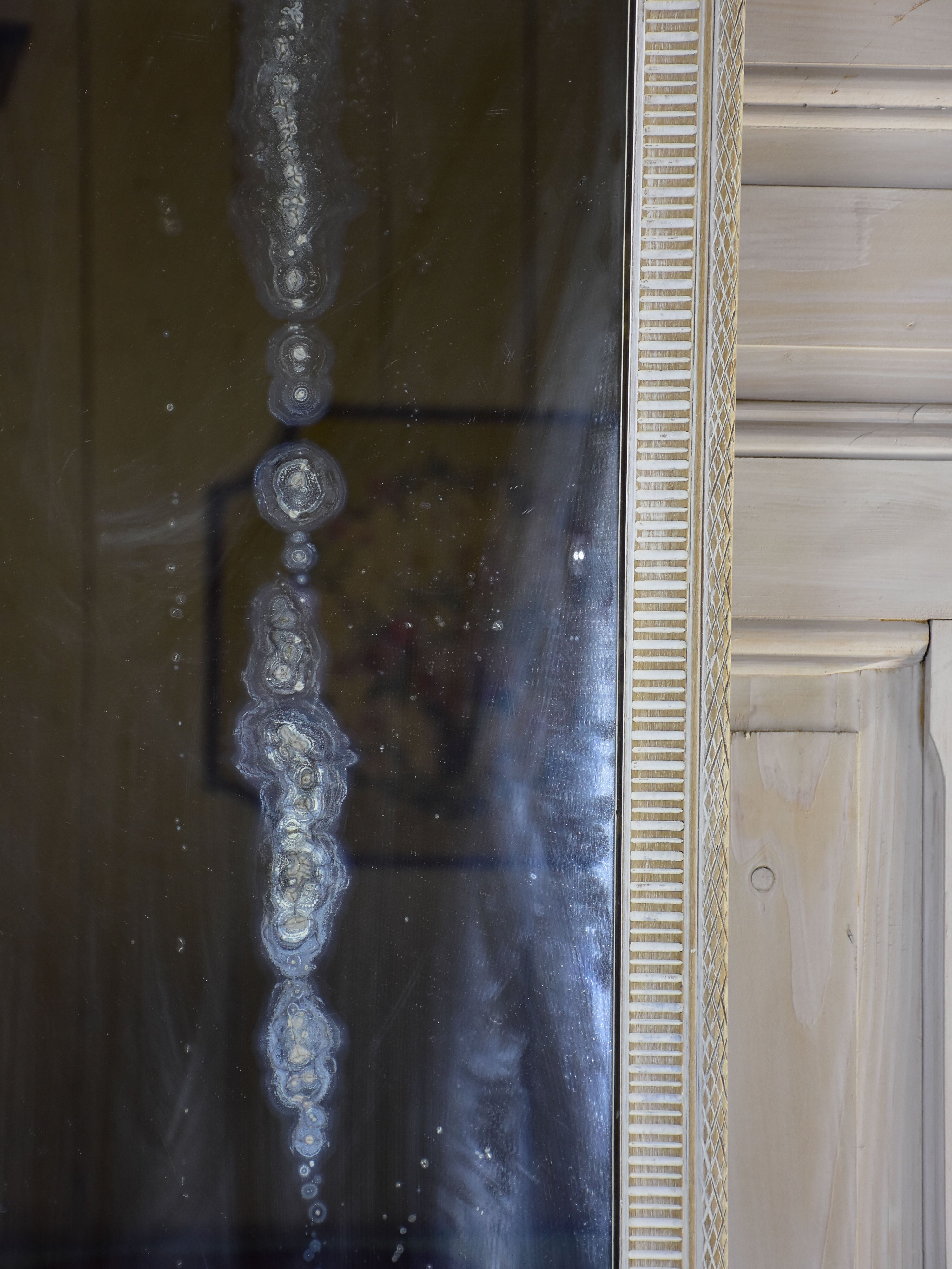 19th century Louis XVI style mirror with white frame 19 ¾'' x 52”