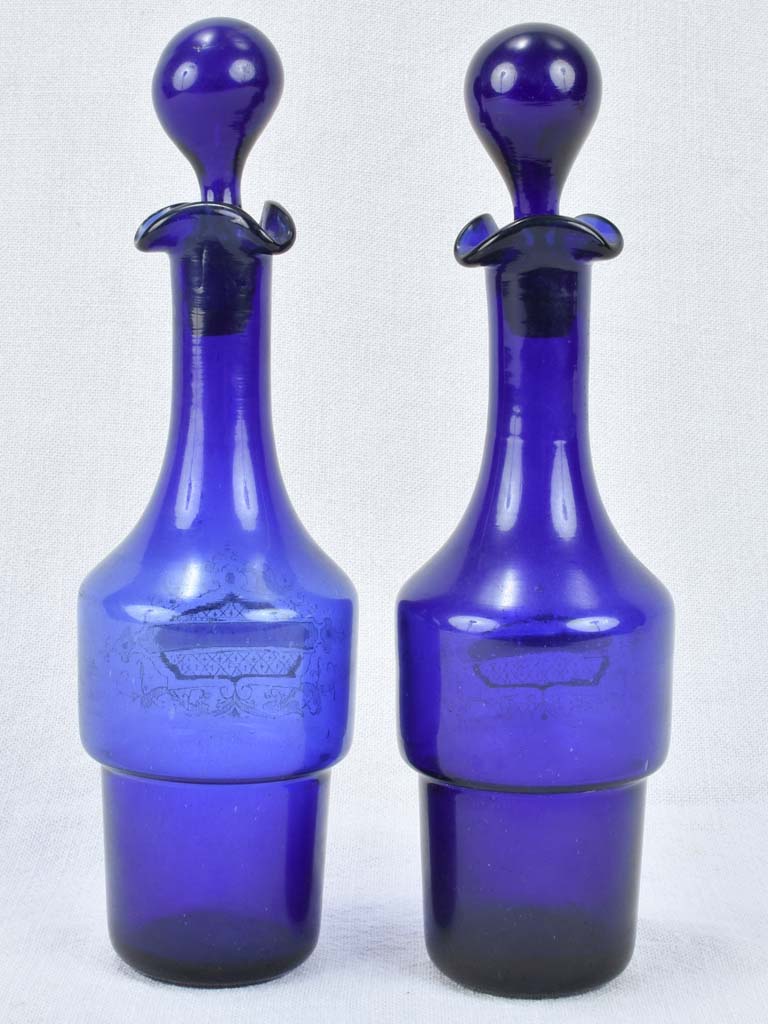 Blue glass oil and vinegar carafes 10¾"