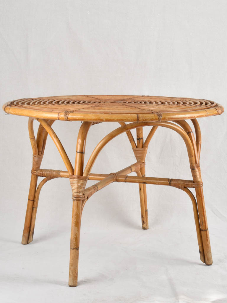 Vintage rattan table with four chairs