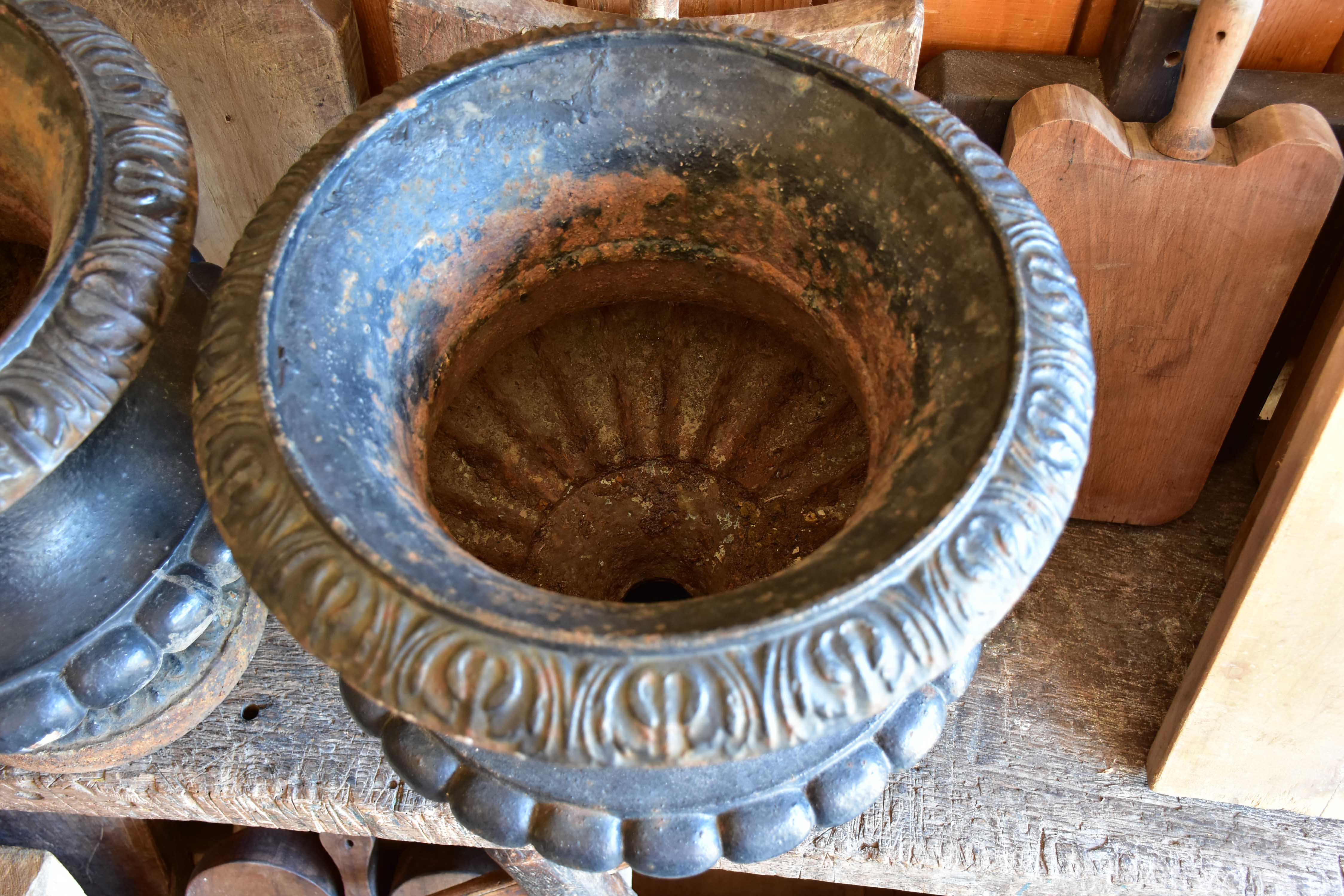 Pair of black antique French garden urns