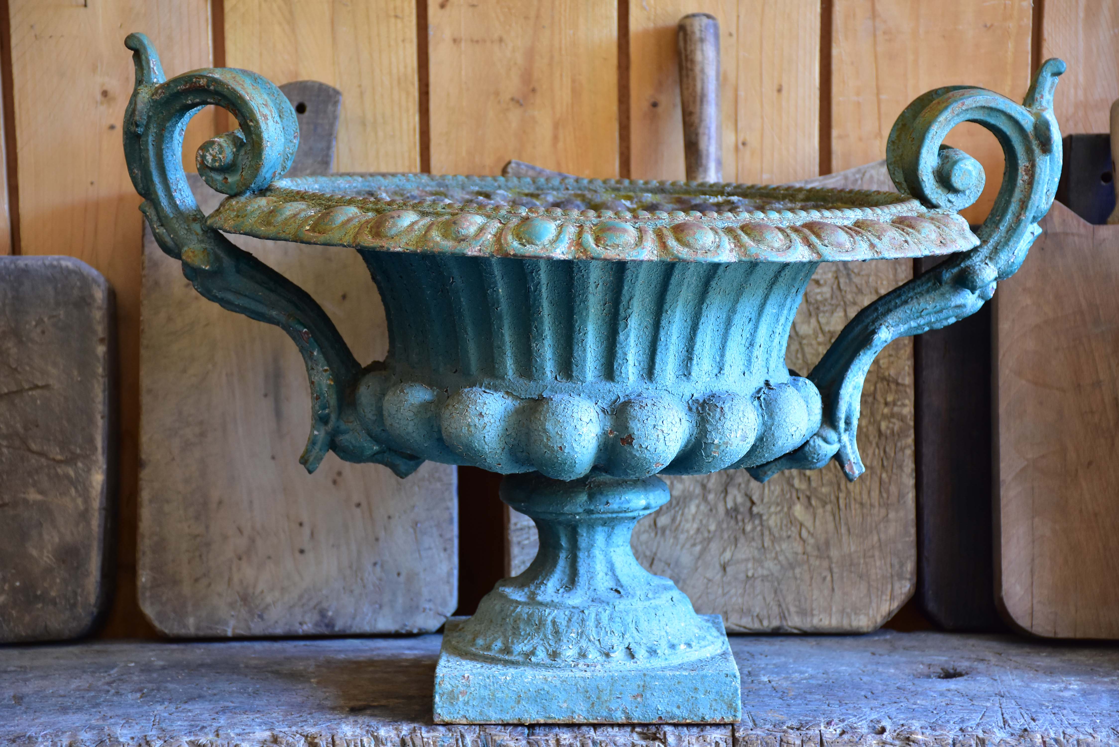 Late 19th century Chambord garden urn with green patina and decorative handles