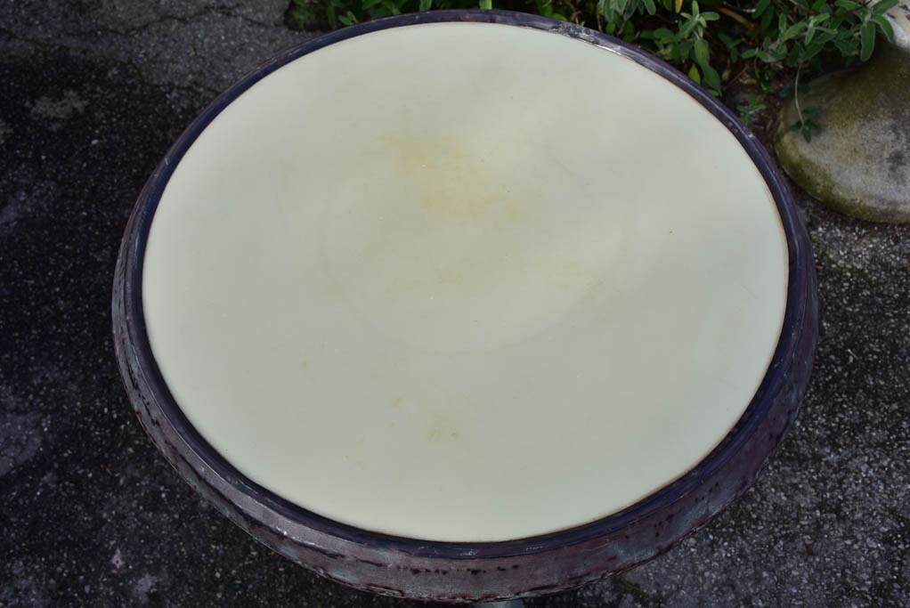 Art Nouveau cast iron bistro table with beige glass table top