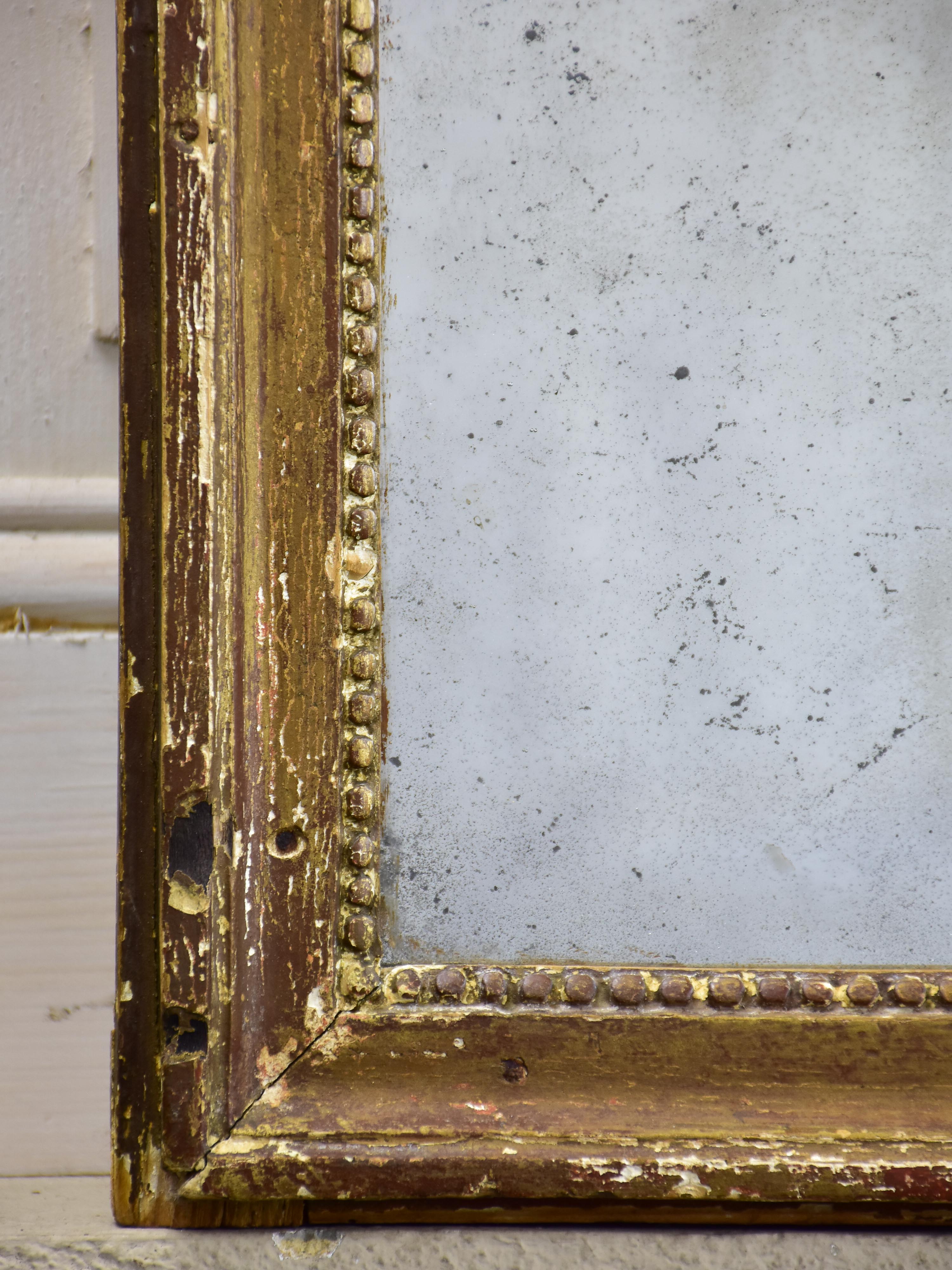 Rustic Louis XVI mirror with gilded frame 20” x 25 ½''