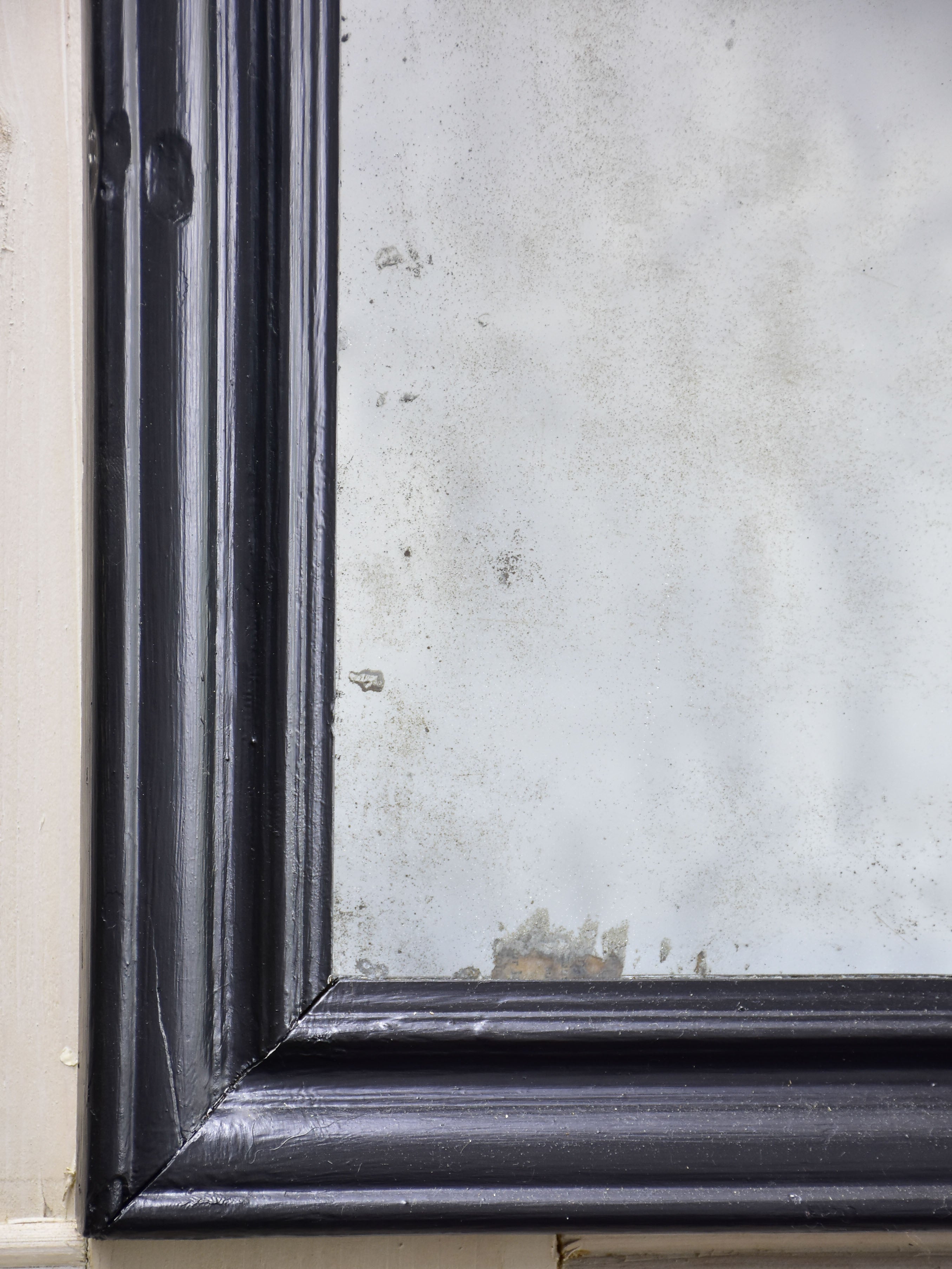 19th century French bistro mirror with black frame