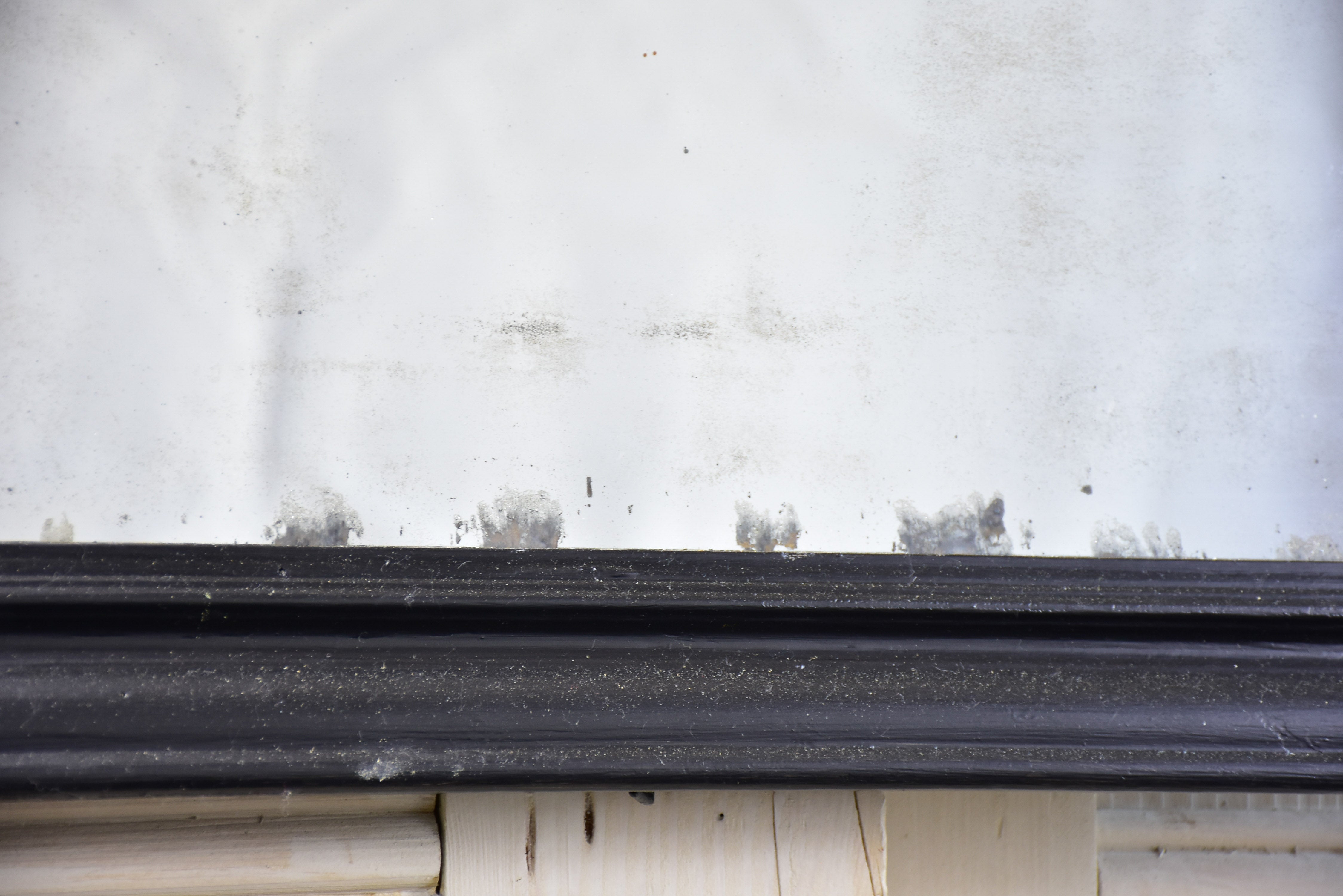 19th century French bistro mirror with black frame