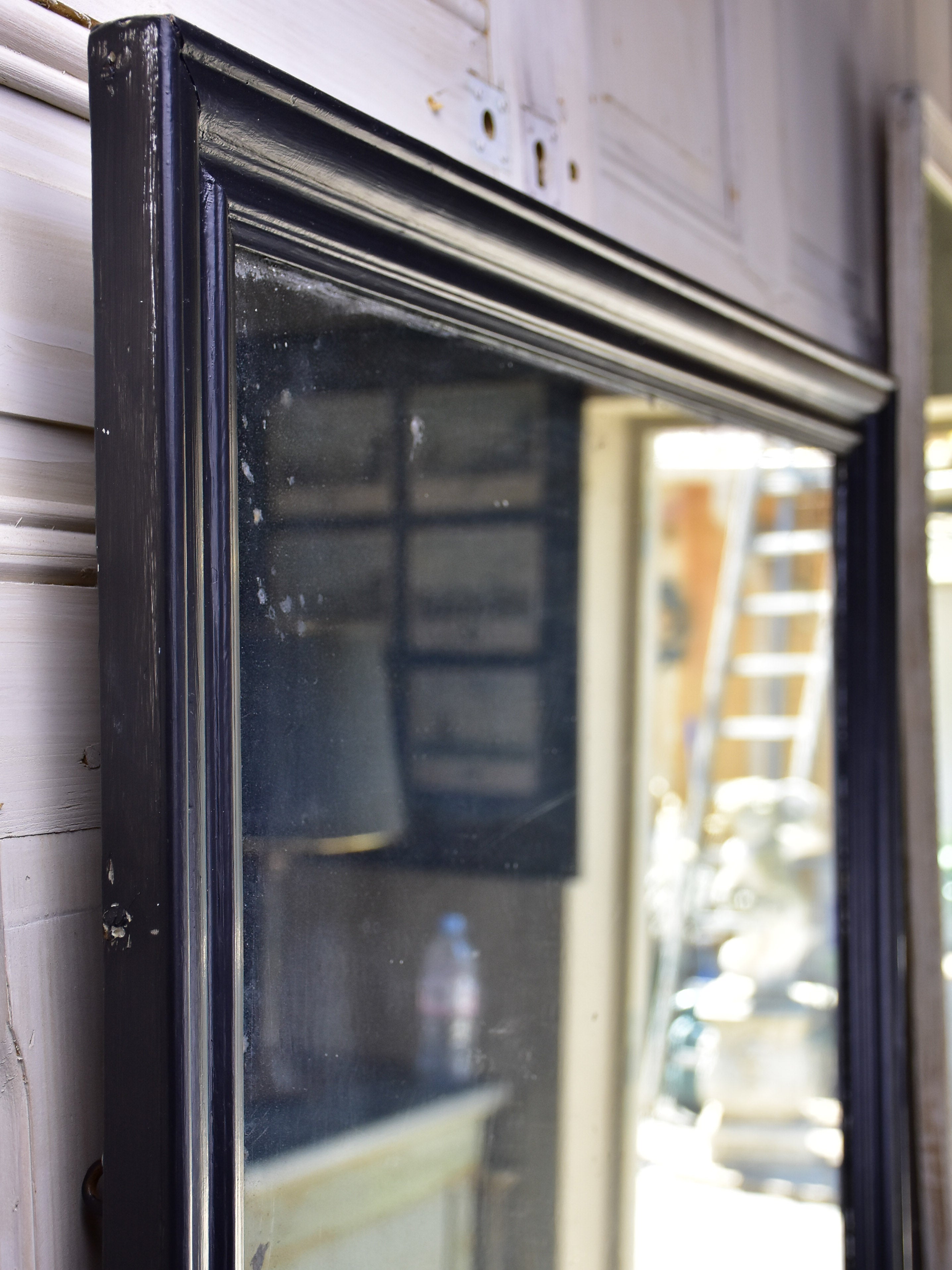 19th century French bistro mirror with black frame