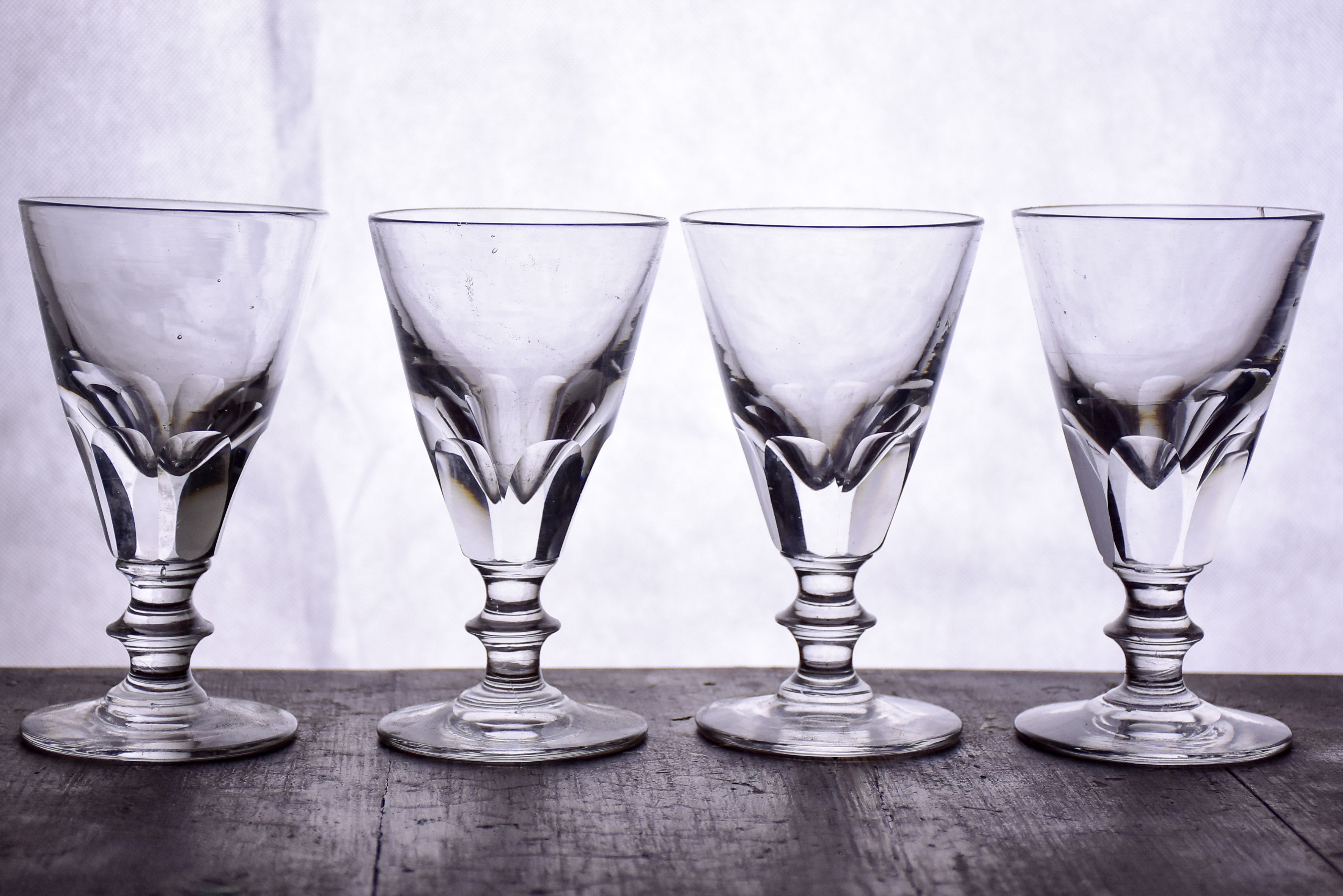 Set of eight antique absinthe glasses