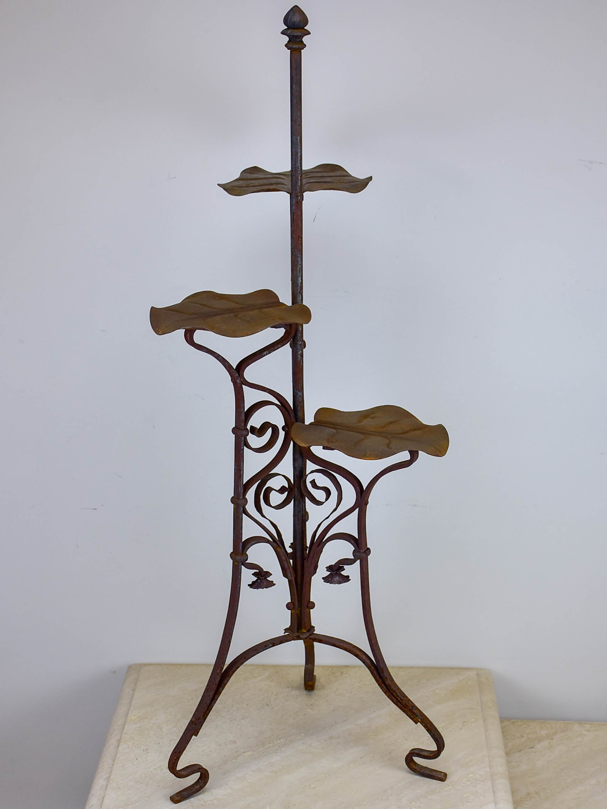 Antique French plant stand with lily pad leaves