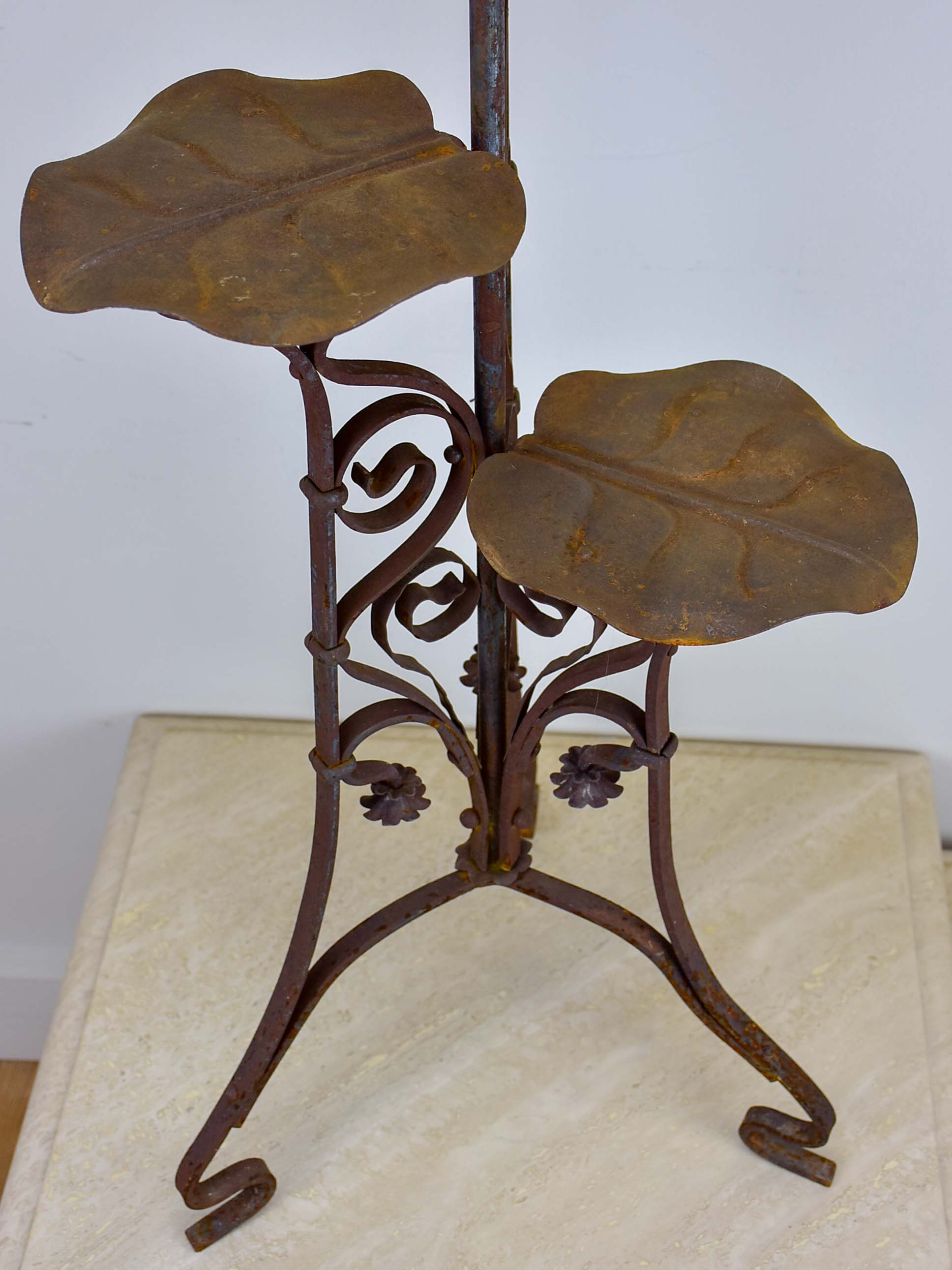 Antique French plant stand with lily pad leaves