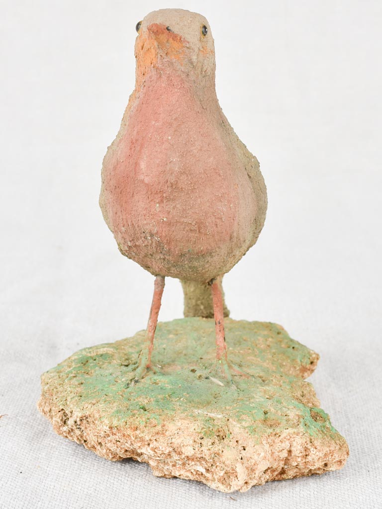 Artisan-made sculpture of a small pink bird 6¼"