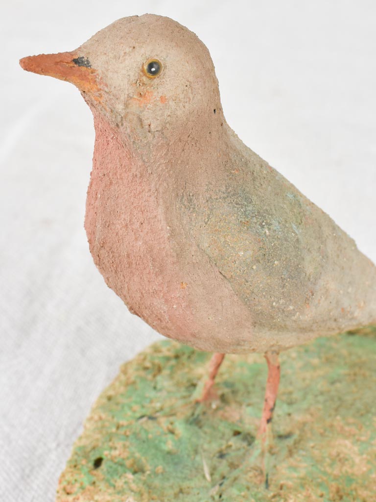 Artisan-made sculpture of a small pink bird 6¼"