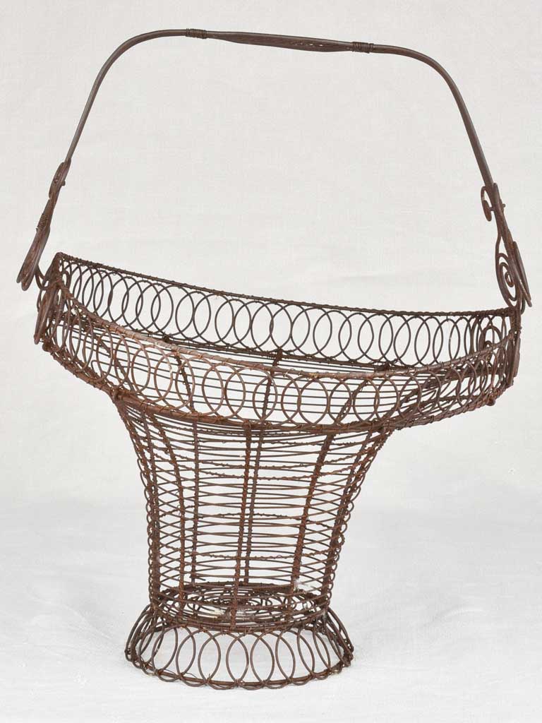 Elegant 20th-century woven wire magazine holder