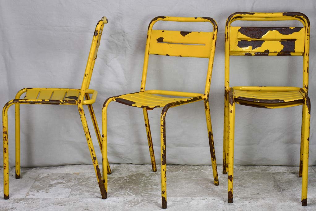 12 yellow metal 1950s Tolix chairs - stackable