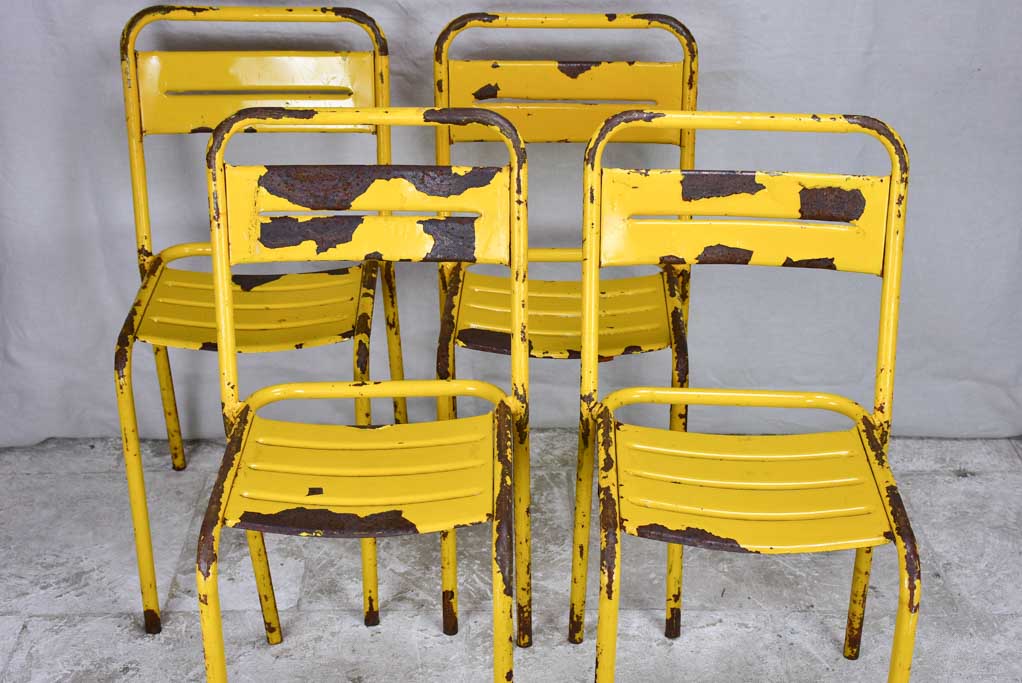 12 yellow metal 1950s Tolix chairs - stackable