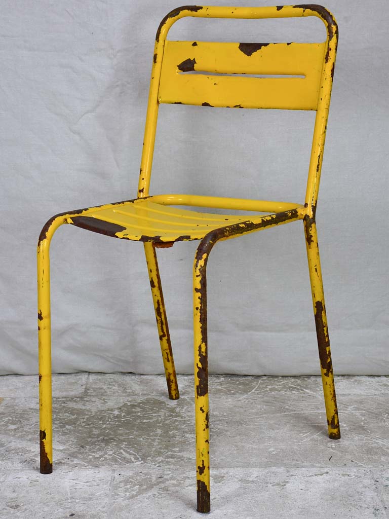 12 yellow metal 1950s Tolix chairs - stackable