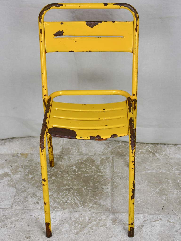 12 yellow metal 1950s Tolix chairs - stackable