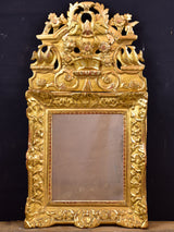 19th century Louis XV style gilded mirror with pediment