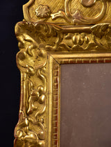 19th century Louis XV style gilded mirror with pediment