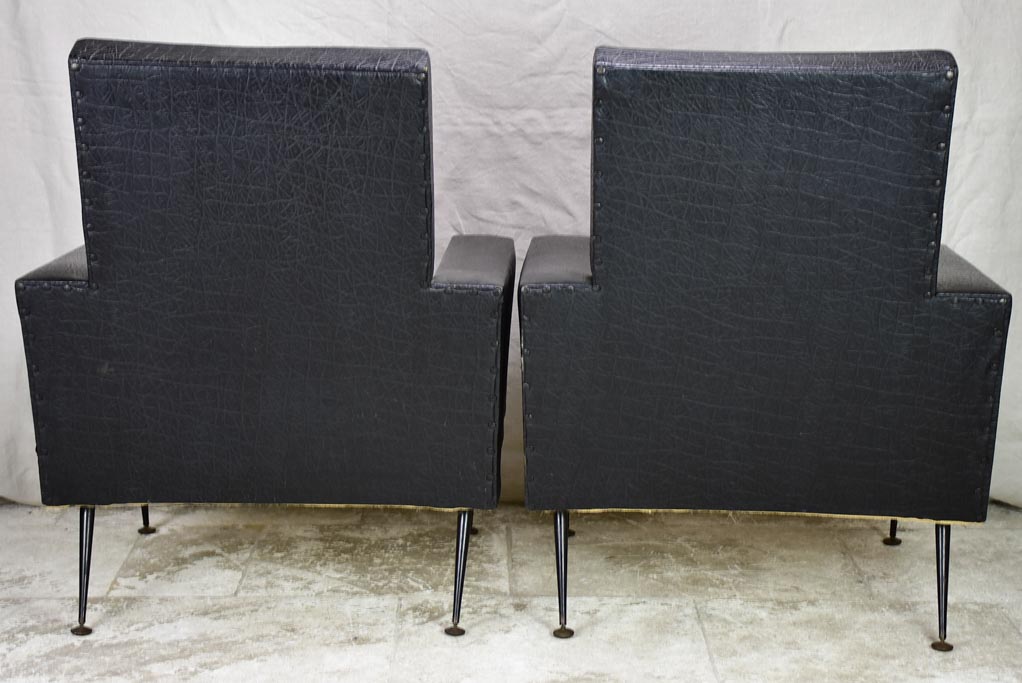 Pair of 1950's armchair faux black leather