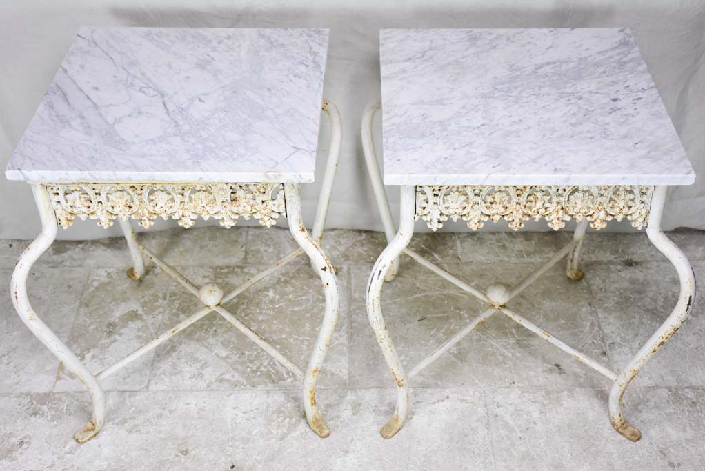 Pair of white cast iron and Carrara marble side tables