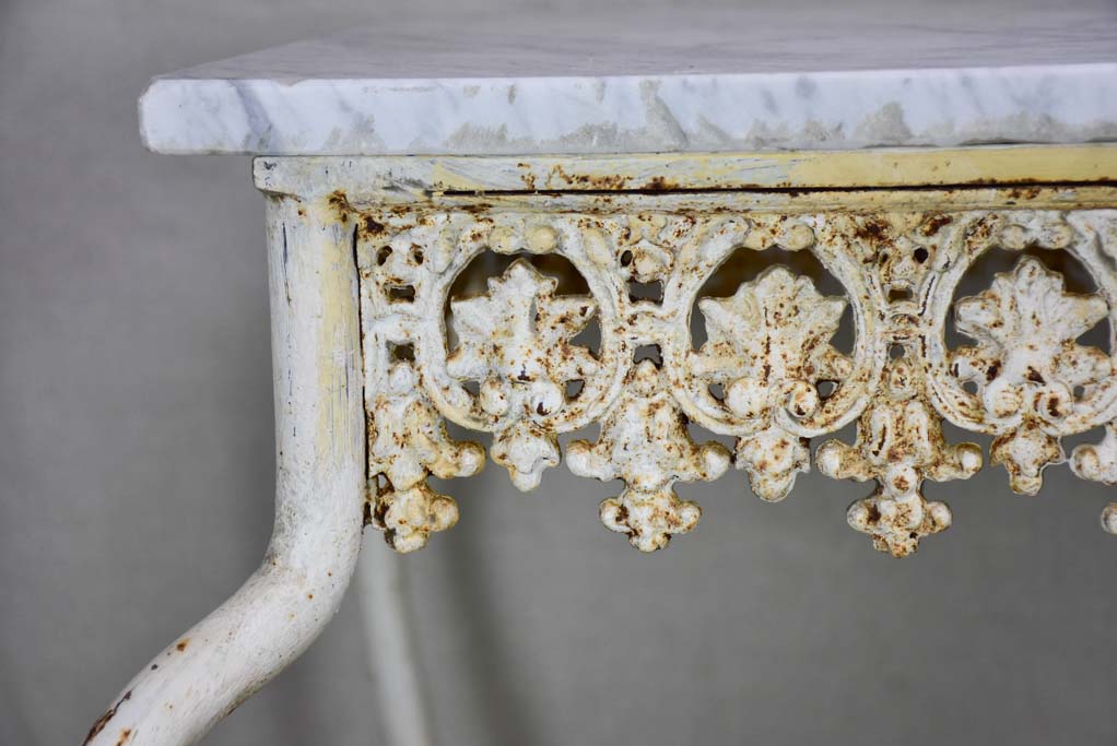 Pair of white cast iron and Carrara marble side tables