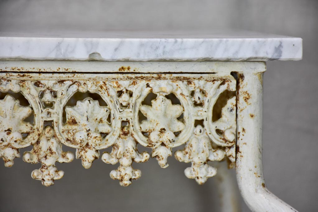 Pair of white cast iron and Carrara marble side tables