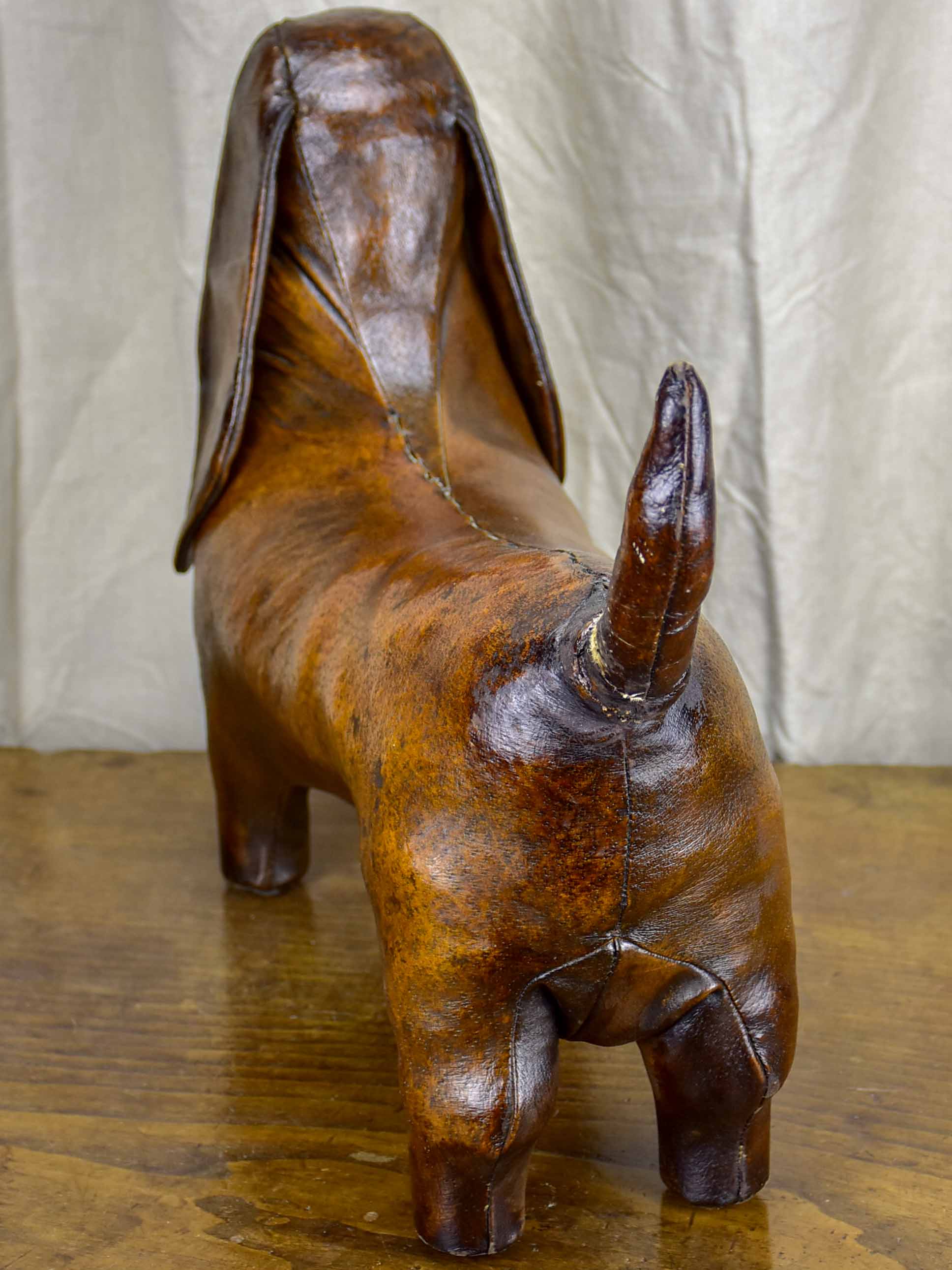 Antique Valenti leather dog footrest