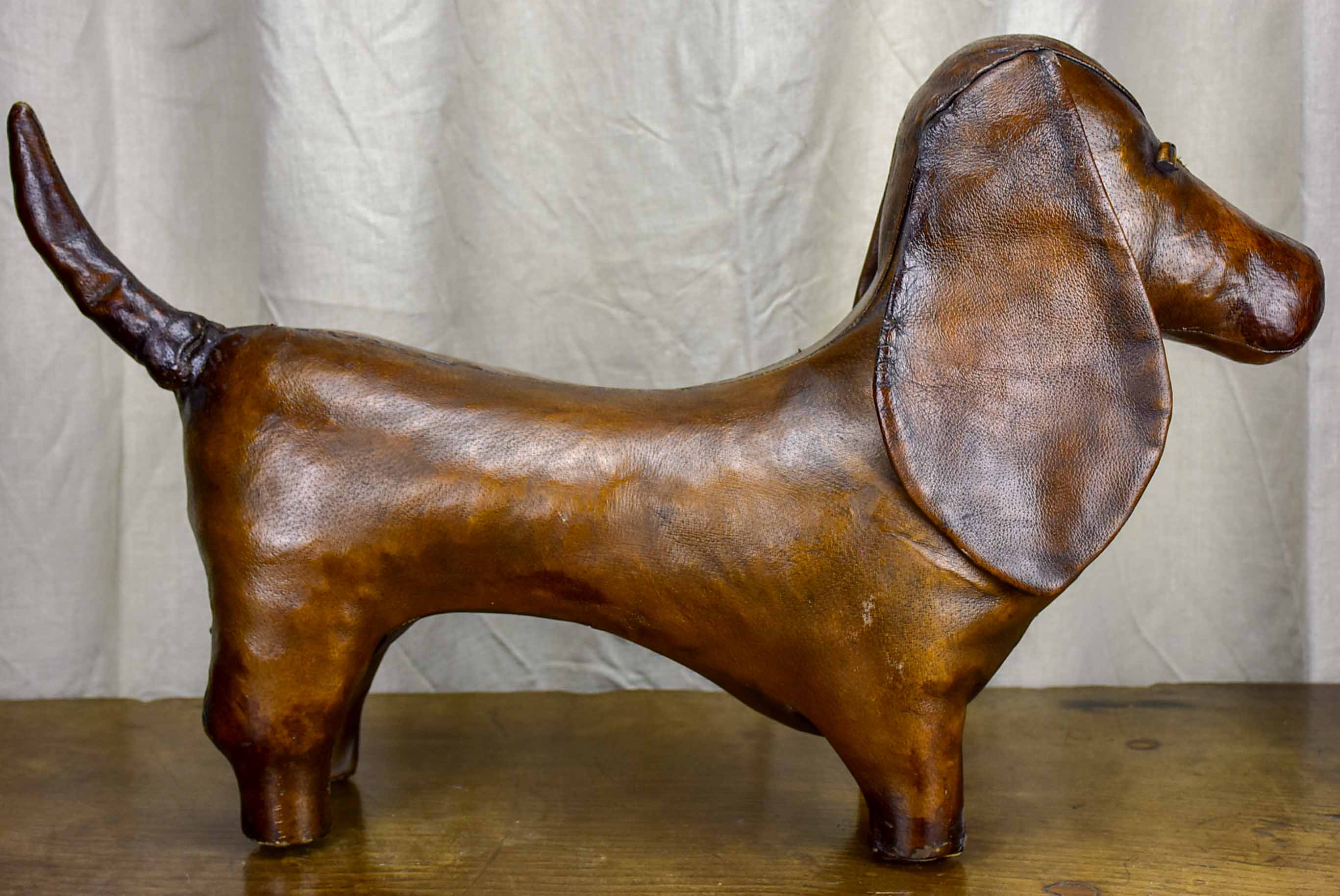 Antique Valenti leather dog footrest