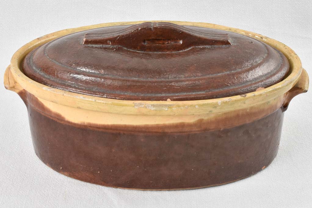 Antique timeworn glazed terracotta tureen