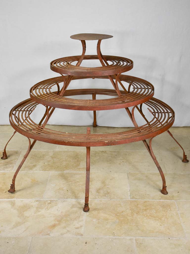 Rare round Arras plant stand with original patina and hoof feet 63¾"