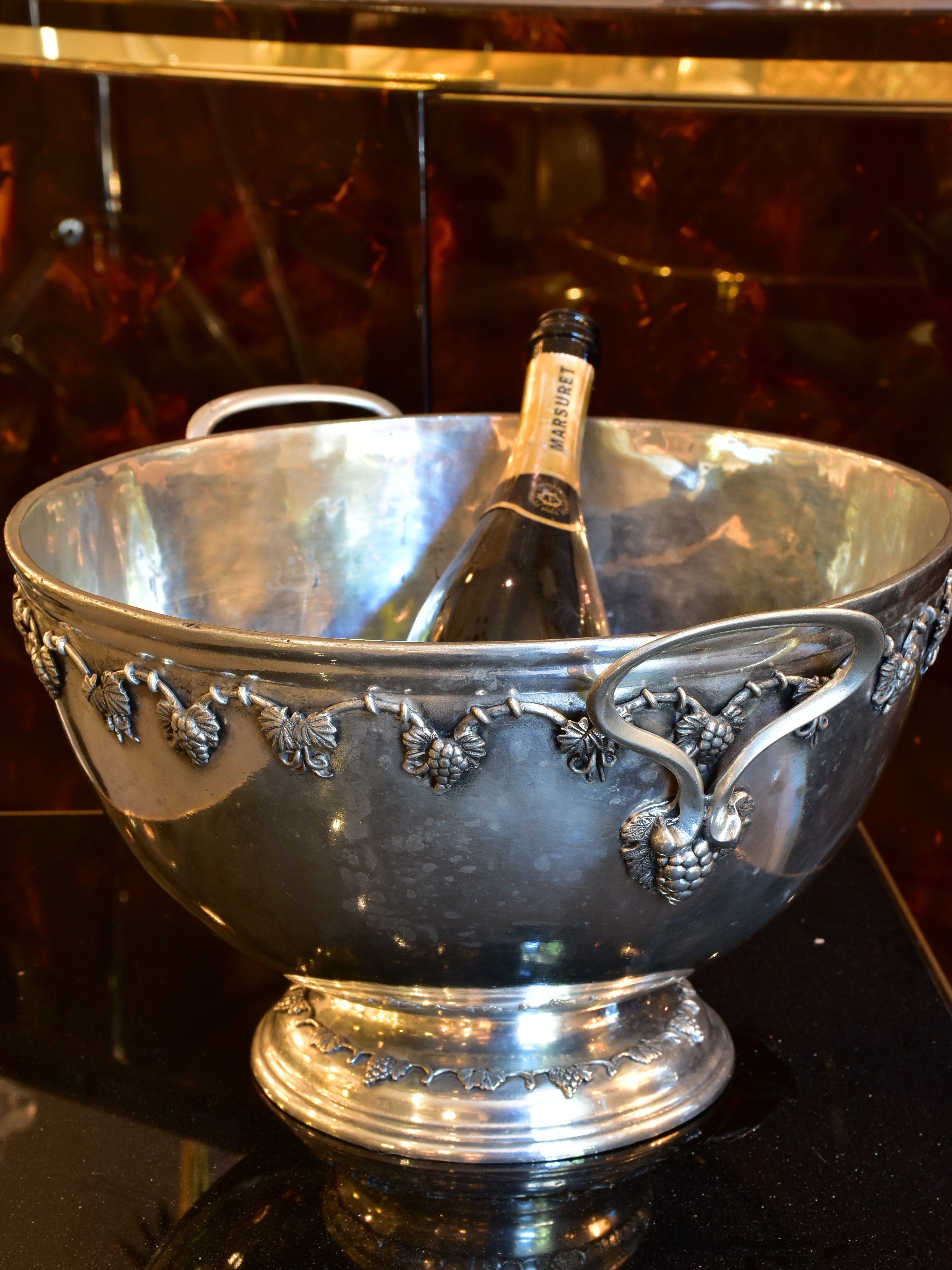 Vintage French champagne bucket with grape motifs