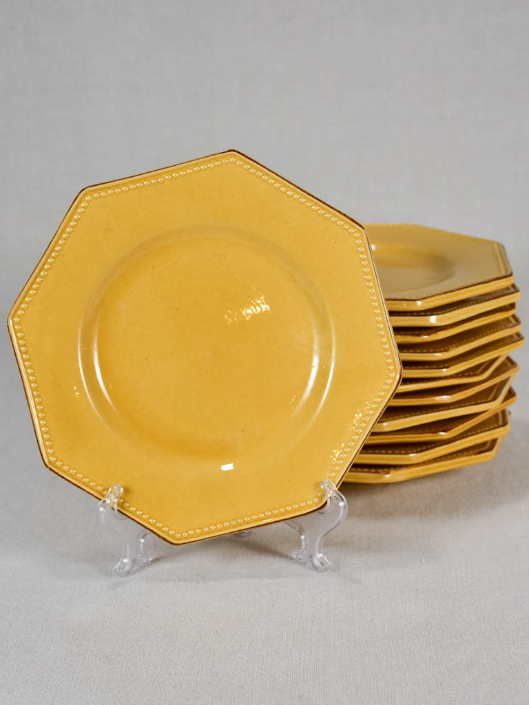 Collection of 12 octagonal plates with yellow ocher glaze 9½"